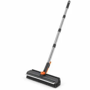 MPV grey and orange 3-in-1 floor scrub brush with a long silver handle, black bristles, squeegee blade and clipped hair-removal tweezers.